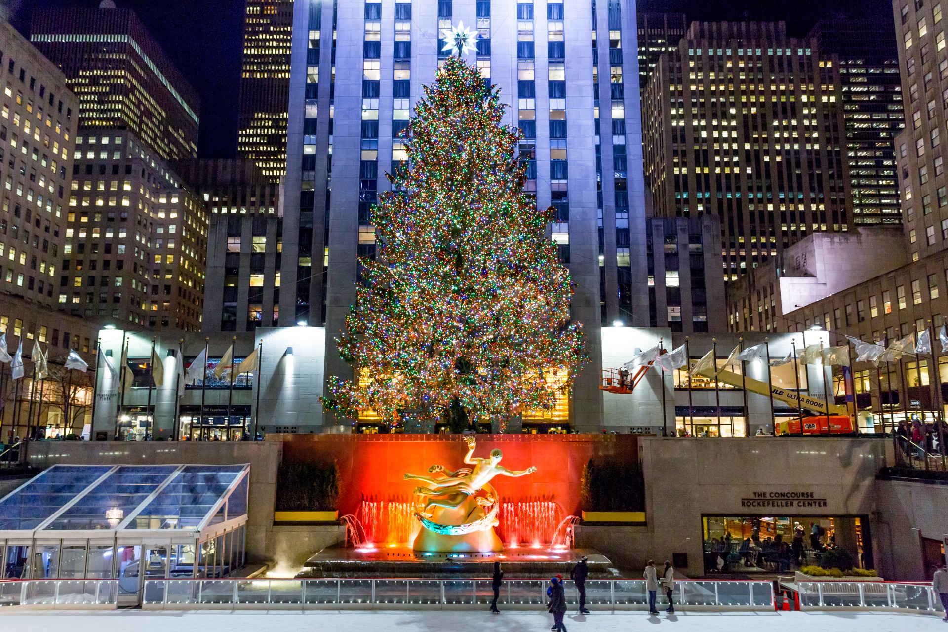 A Christmas tree is lit at Rockefeller Center.